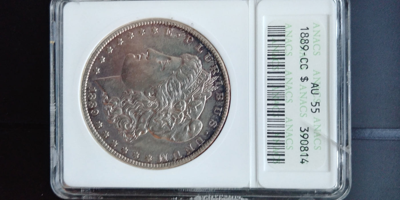 1889 CC Morgan Dollar ANACS - AU55 The holder has a crack along the edge which does not affect anything.  The hologram is still intact. A beautiful coin rarely seen in this high grade.  - US Coin