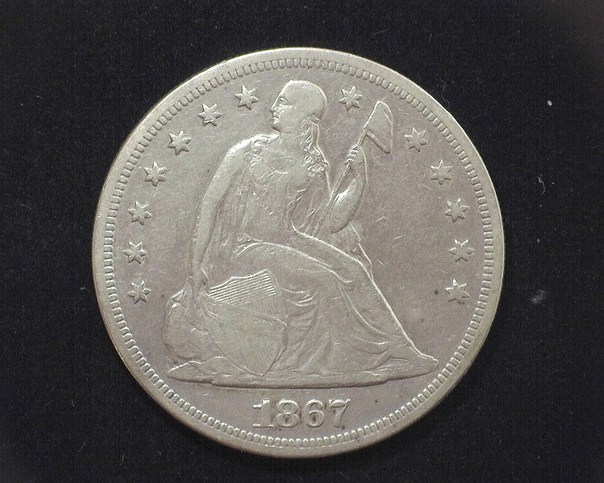 1867 Liberty Seated Dollar XF Motto- US Coin